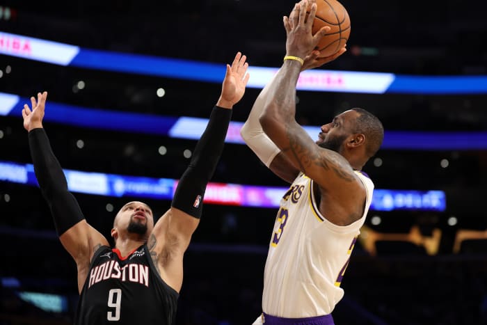 Lakers forward LeBron James (23) shoots over Houston Rockets forward Dillon Brooks (9) during the second quarter at Crypto.com Arena